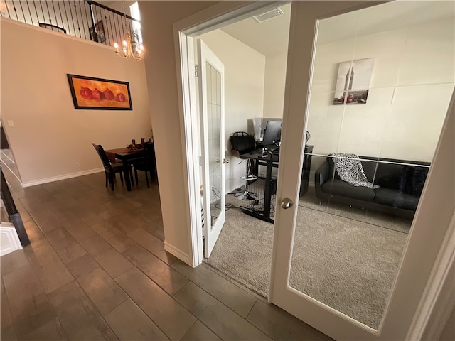 hall featuring dark wood-type flooring