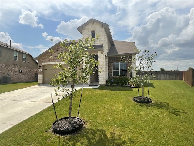 view of front facade with a front lawn, a garage, and cooling unit