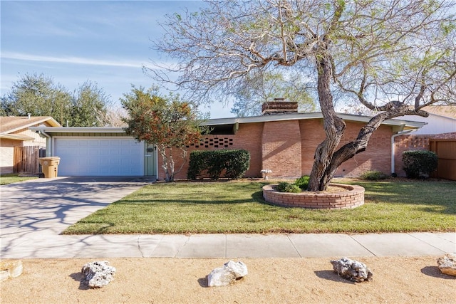 ranch-style home featuring a garage and a front yard