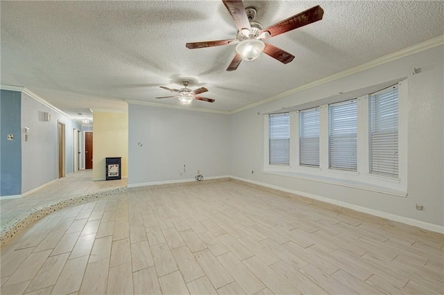 spare room with light wood-type flooring, a textured ceiling, and crown molding