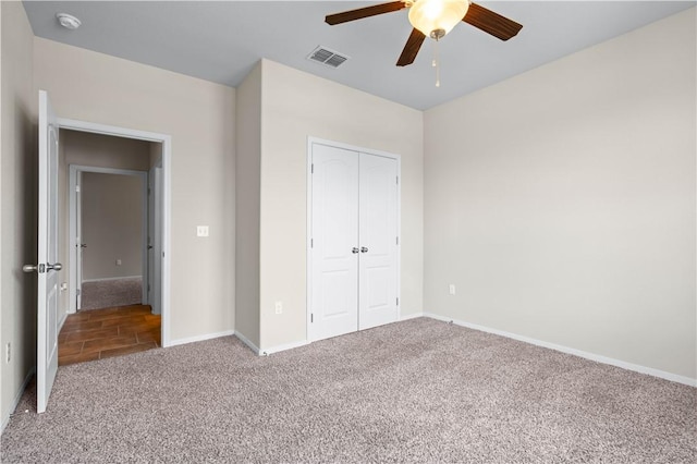 1733 Rhumba Trl, Corpus Christi, TX 78410 - unfurnished bedroom featuring carpet floors, a closet, baseboards, and ceiling fan