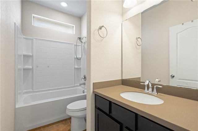 1733 Rhumba Trl, Corpus Christi, TX 78410 - bathroom with toilet, tile patterned floors, vanity, and tub / shower combination