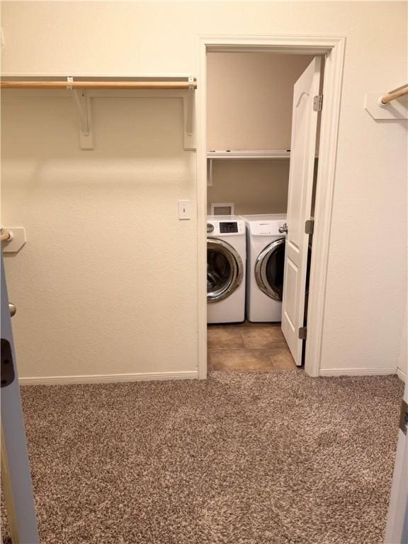 1733 Rhumba Trl, Corpus Christi, TX 78410 - laundry area with washing machine and clothes dryer, baseboards, and carpet