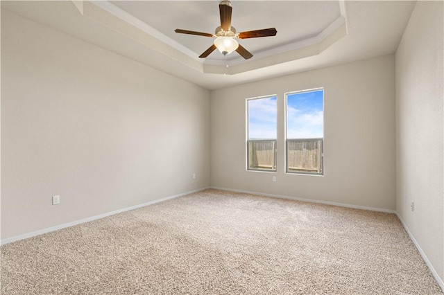 1733 Rhumba Trl, Corpus Christi, TX 78410 - carpeted spare room with a tray ceiling, a ceiling fan, and baseboards