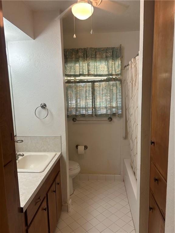6026 Killarmet, Corpus Christi, TX 78413 - full bath with tile patterned flooring, toilet, vanity, and shower / bath combination with curtain