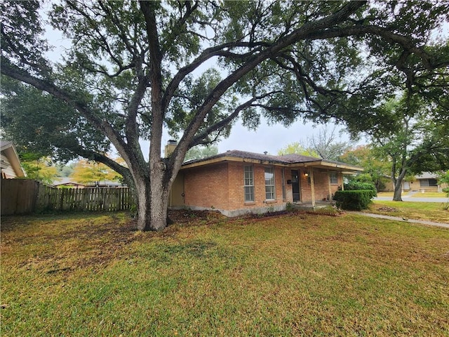 exterior space featuring a front yard