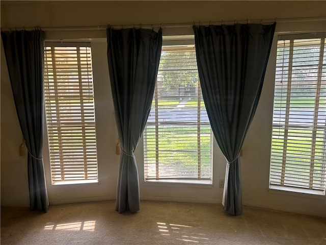 6026 Killarmet, Corpus Christi, TX 78413 - spare room featuring carpet and healthy amount of natural light