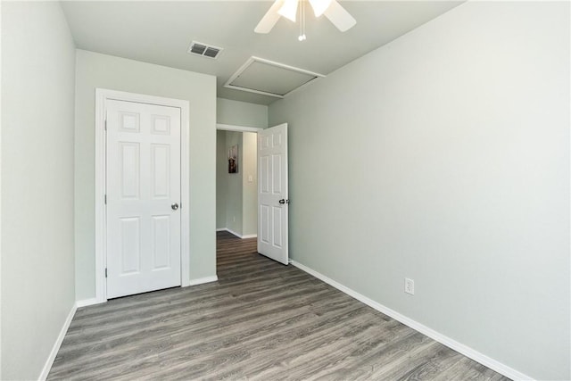 unfurnished bedroom featuring hardwood / wood-style flooring and ceiling fan