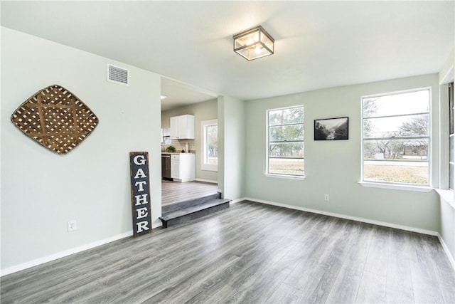 interior space with hardwood / wood-style floors