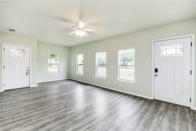 entryway with ceiling fan and dark hardwood / wood-style flooring