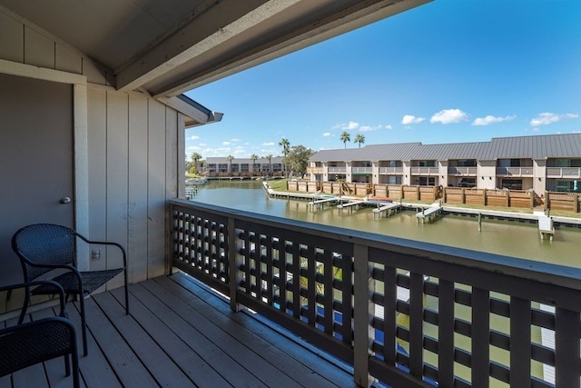 balcony featuring a water view