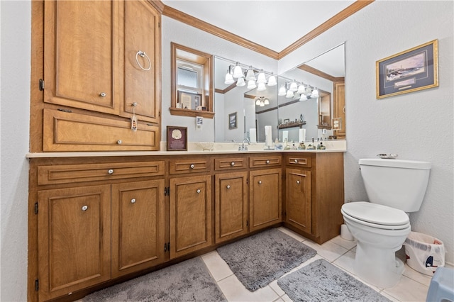 bathroom featuring tile patterned floors, toilet, vanity, and ornamental molding