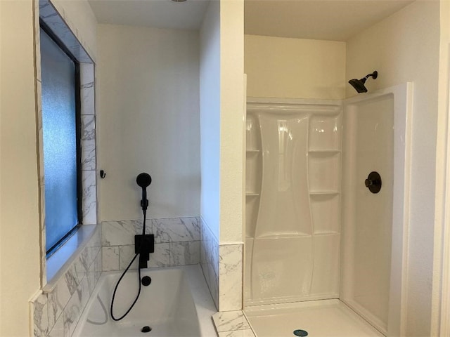 bathroom featuring walk in shower