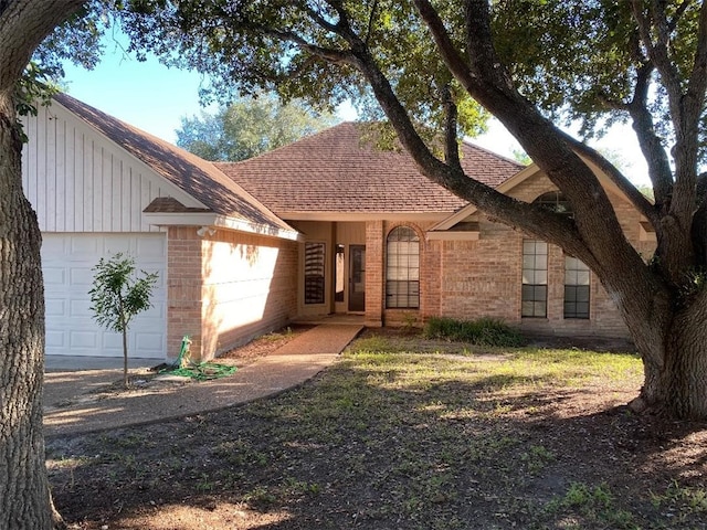 ranch-style home with a garage