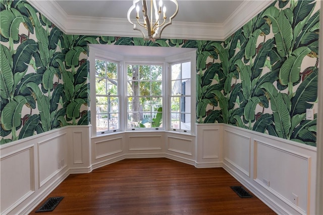 unfurnished dining area with wallpapered walls and visible vents