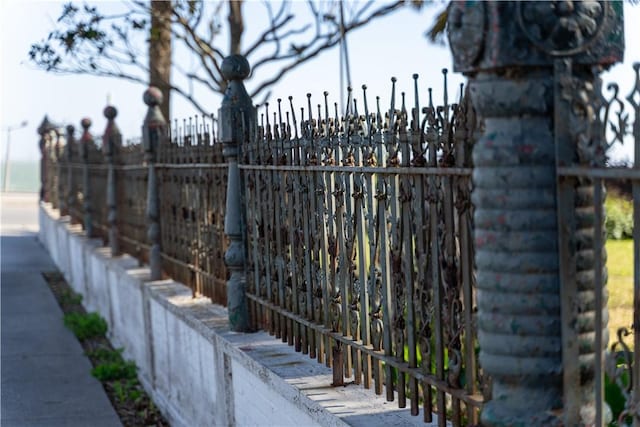 view of gate featuring fence