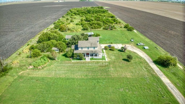 birds eye view of property with a rural view