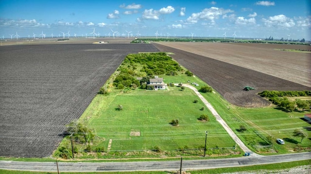 birds eye view of property with a rural view