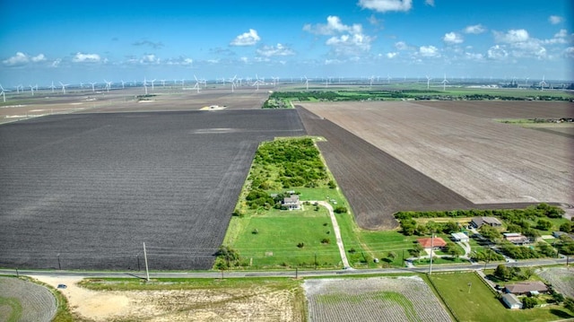 birds eye view of property with a rural view