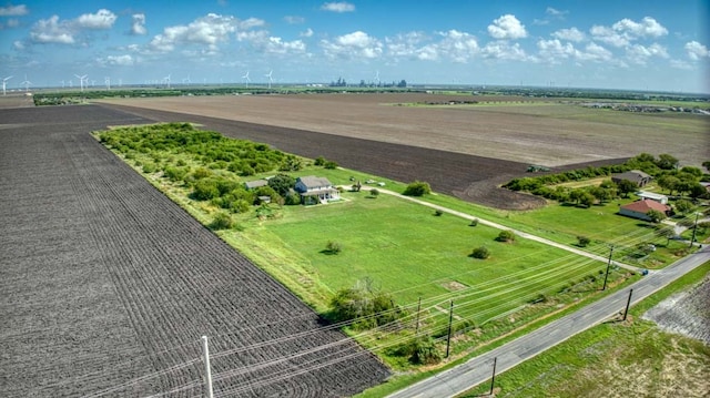 birds eye view of property featuring a rural view