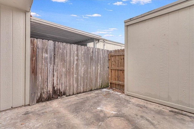 view of patio featuring fence