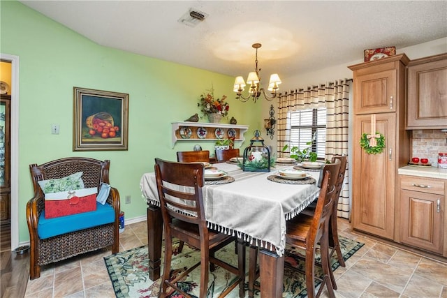 dining room with an inviting chandelier