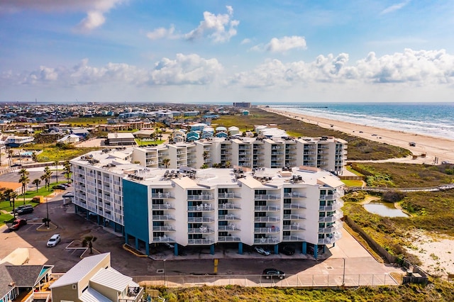 bird's eye view featuring a beach view and a water view