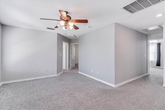 10 W Bar Le Doc Dr, Corpus Christi, TX 78414 - carpeted empty room with attic access, a ceiling fan, and a smoke detector