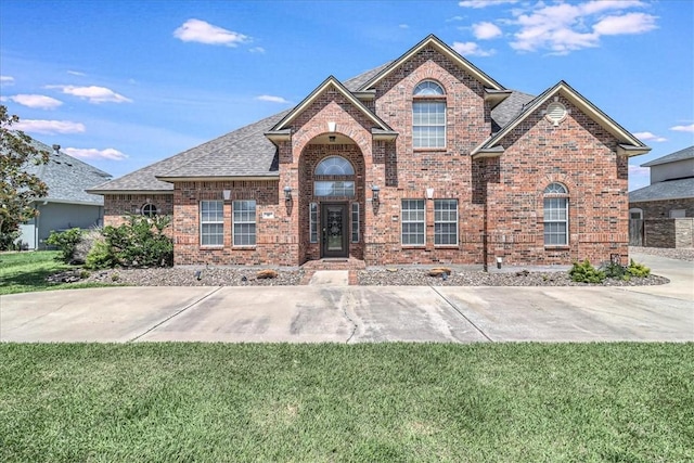 view of front property with a front yard