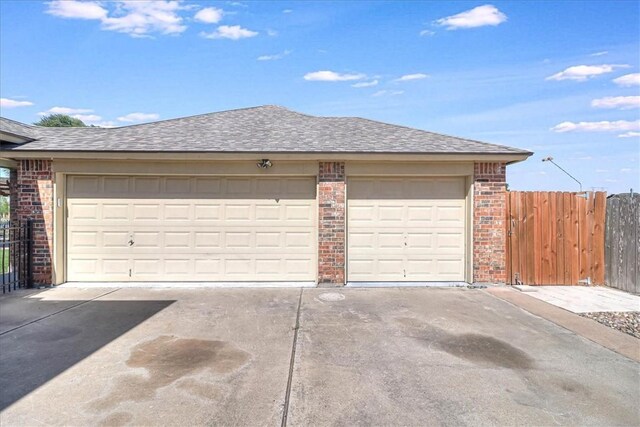 10 W Bar Le Doc Dr, Corpus Christi, TX 78414 - garage featuring concrete driveway