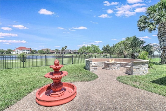 10 W Bar Le Doc Dr, Corpus Christi, TX 78414 - view of yard featuring a fire pit, a residential view, and a patio