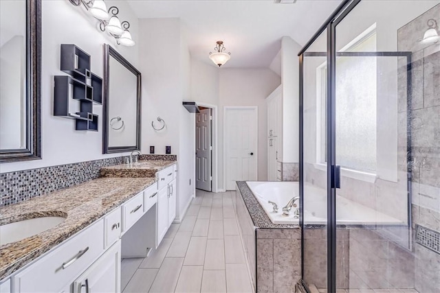 bathroom with separate shower and tub, tile patterned floors, and vanity