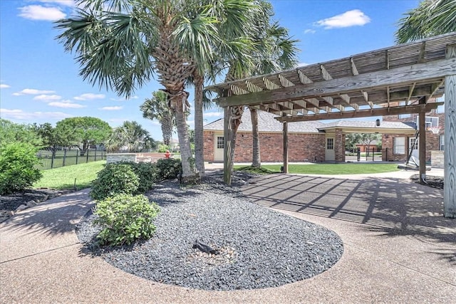 view of yard with a pergola