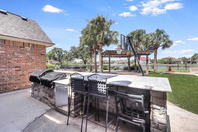 10 W Bar Le Doc Dr, Corpus Christi, TX 78414 - view of patio / terrace featuring exterior kitchen