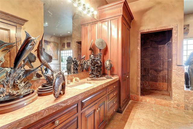 215 Oleander, Corpus Christi, TX 78404 - bathroom featuring tiled shower, vanity, and healthy amount of natural light