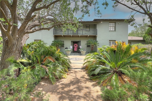 215 Oleander, Corpus Christi, TX 78404 - view of front of home featuring a balcony and brick siding