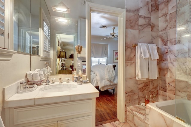 215 Oleander, Corpus Christi, TX 78404 - full bathroom featuring ensuite bath, vanity, a tub, and a ceiling fan