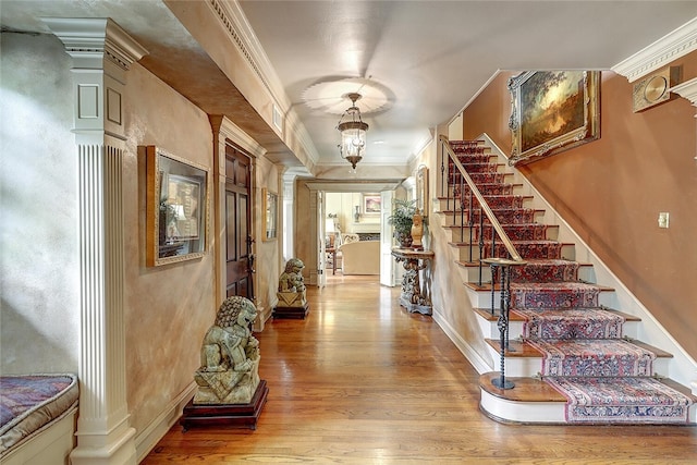 215 Oleander, Corpus Christi, TX 78404 - entryway with ornamental molding, wood finished floors, stairs, and baseboards