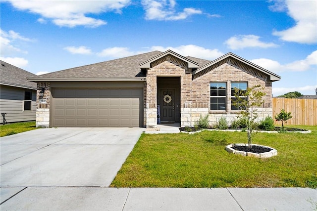 ranch-style house featuring a garage, driveway, a front yard, and fence