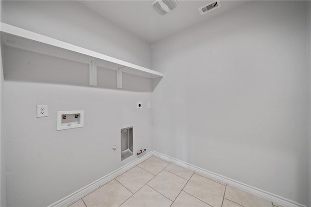 washroom featuring gas dryer hookup, hookup for a washing machine, hookup for an electric dryer, laundry area, and visible vents