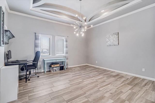 home office with a raised ceiling, light wood-type flooring, ornamental molding, and a chandelier