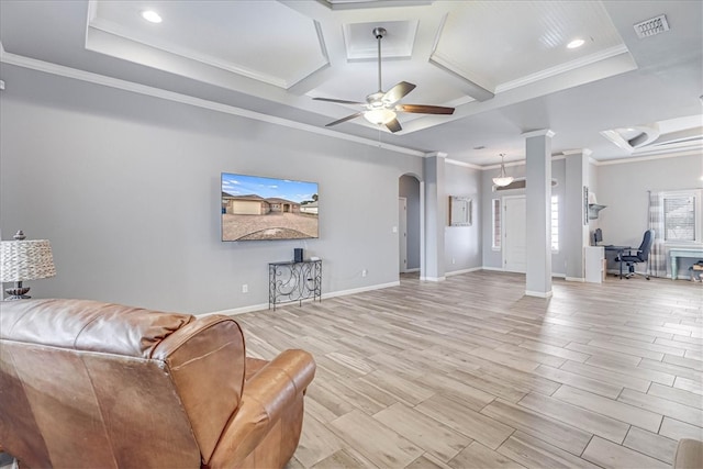 living room with ceiling fan, light hardwood / wood-style floors, coffered ceiling, and ornamental molding