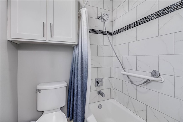 bathroom with shower / tub combo and toilet