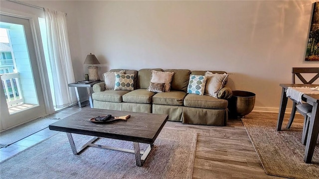 709 Lauderdale Dr, Rockport, TX 78382 - living room featuring wood finished floors and baseboards
