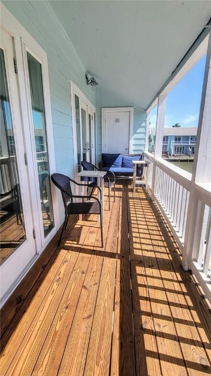 709 Lauderdale Dr, Rockport, TX 78382 - wooden deck with french doors