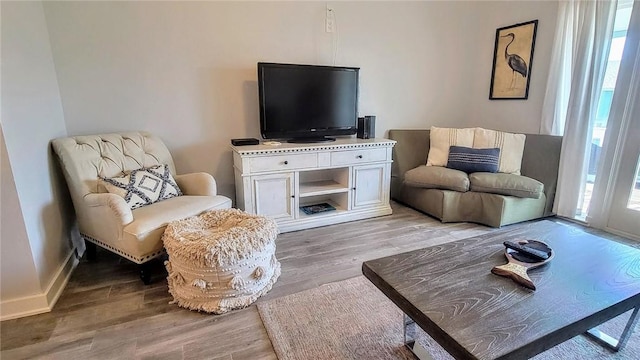 709 Lauderdale Dr, Rockport, TX 78382 - living room featuring light wood finished floors and plenty of natural light