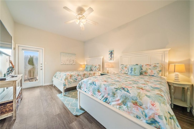 bedroom with access to exterior, dark hardwood / wood-style flooring, and ceiling fan