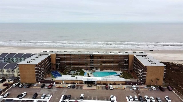 bird's eye view with a beach view and a water view