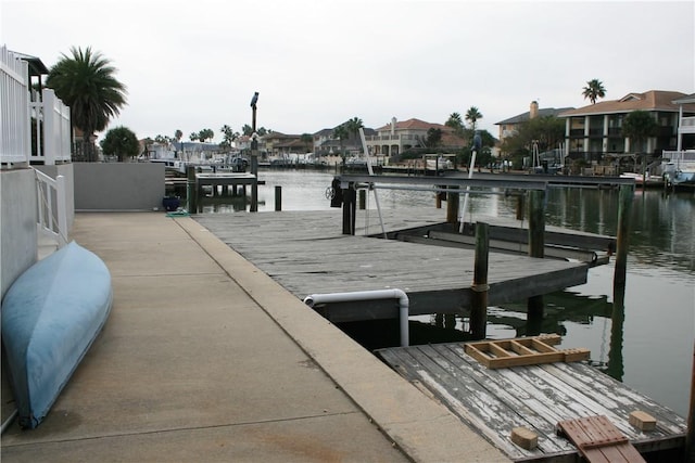 dock area with a water view