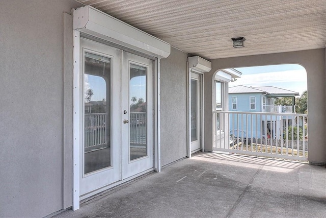 balcony featuring an AC wall unit